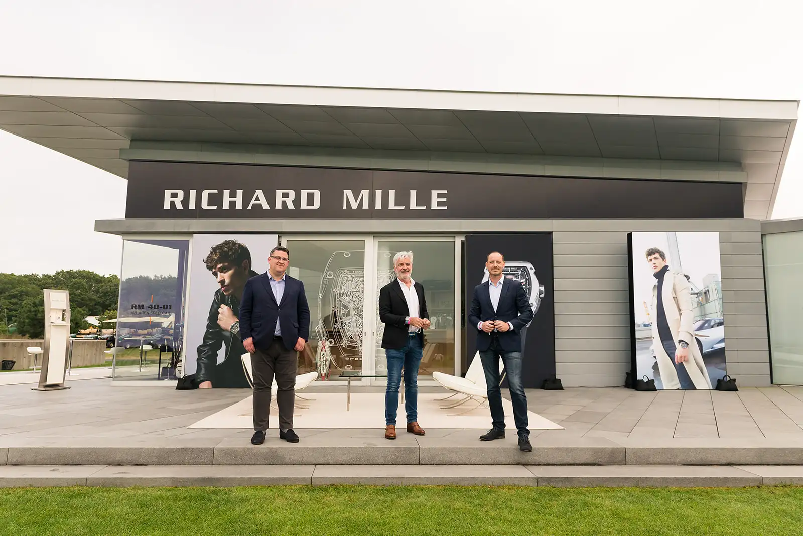 Corporate event photography of 3 men in front of Richard Mille building