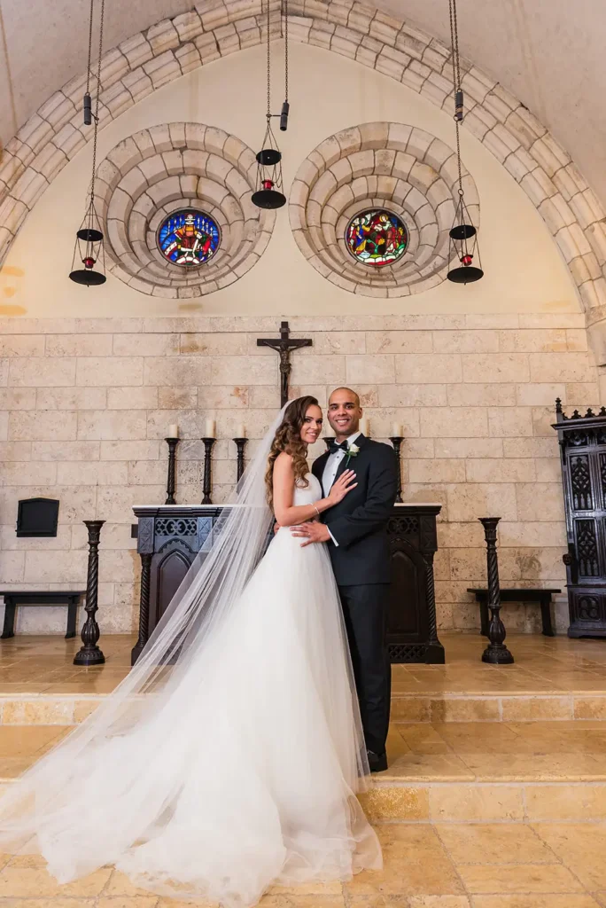 bride and groom at ancient spanish monastery cathedral South FL