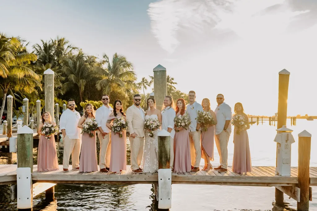 bridal party standing on dock South Florida wedding venue