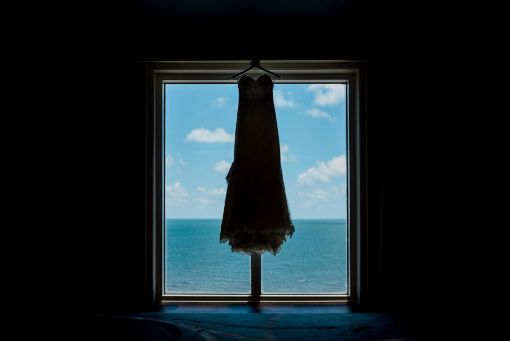 silhouette of wedding dress by ocean South Florida