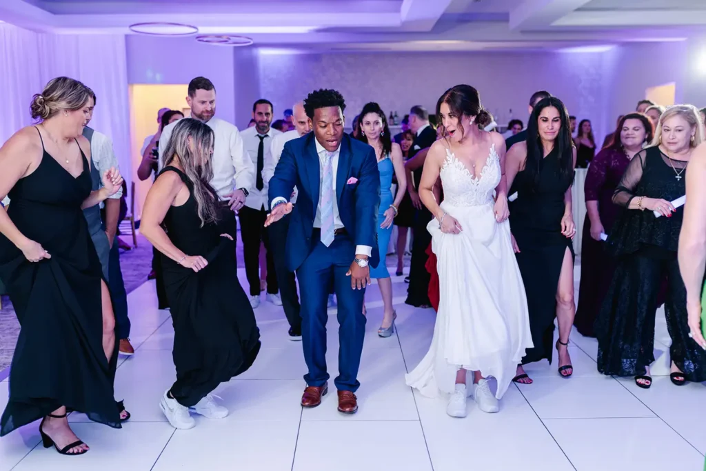 bride dancing with wedding guests at South Fl wedding venue