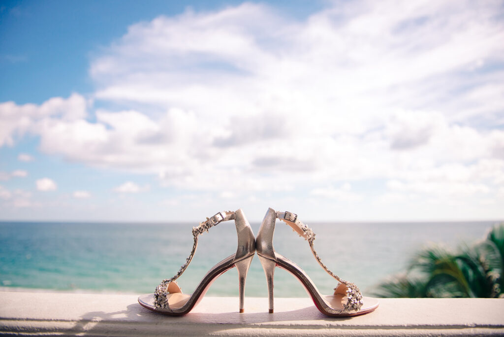 brides high heels by ocean