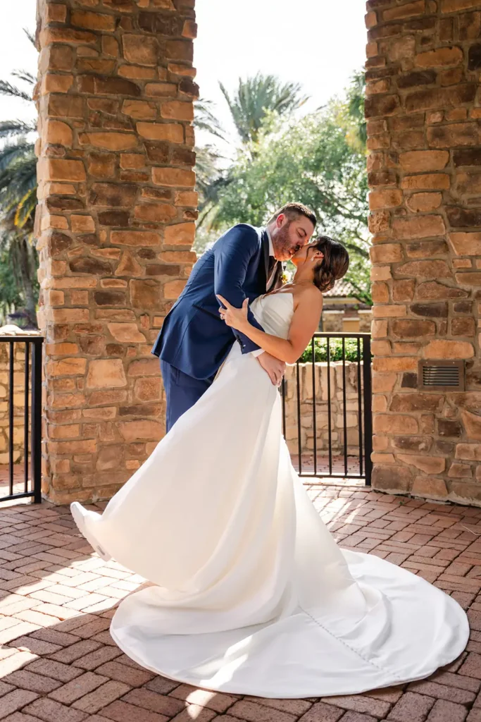 bride and groom kissing at South Florida wedding venue