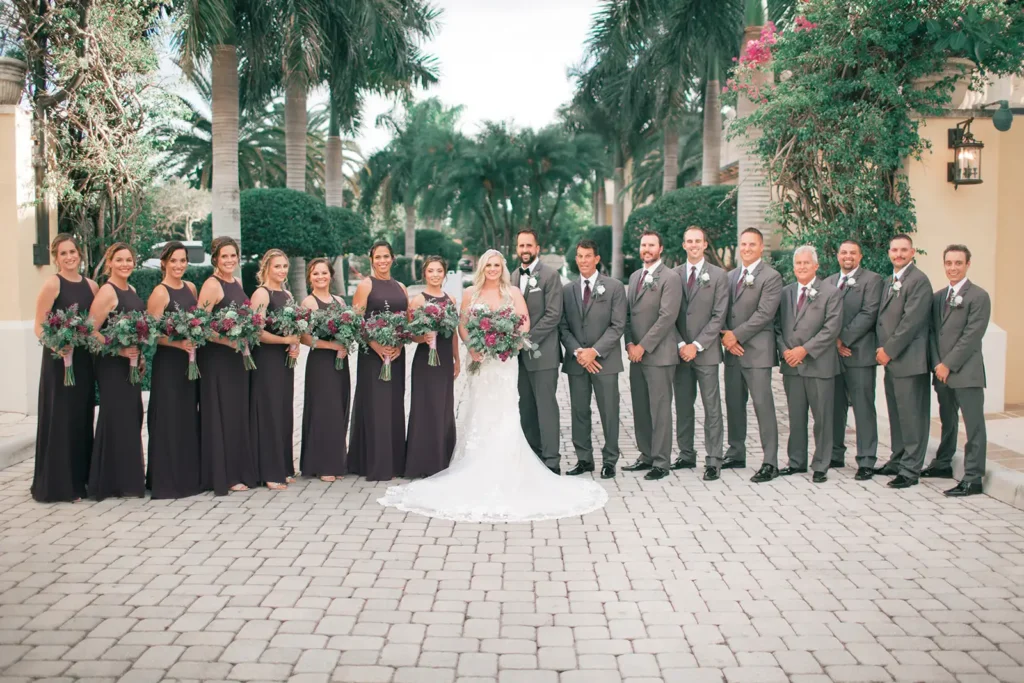 large bridal party standing outside South Florida weding venue