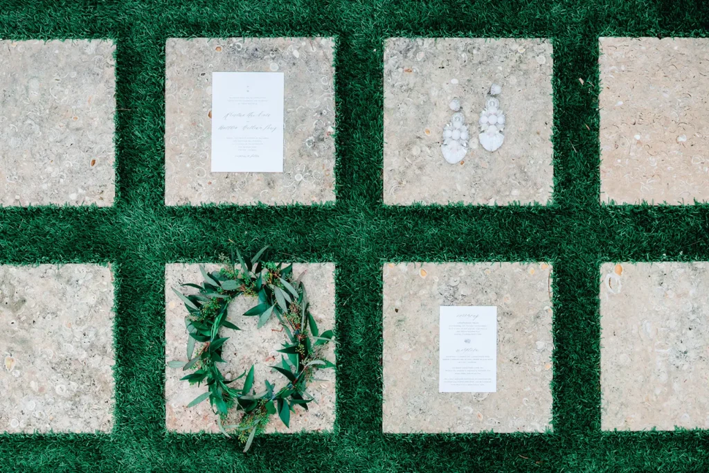 squares of concrete surrounded by grass