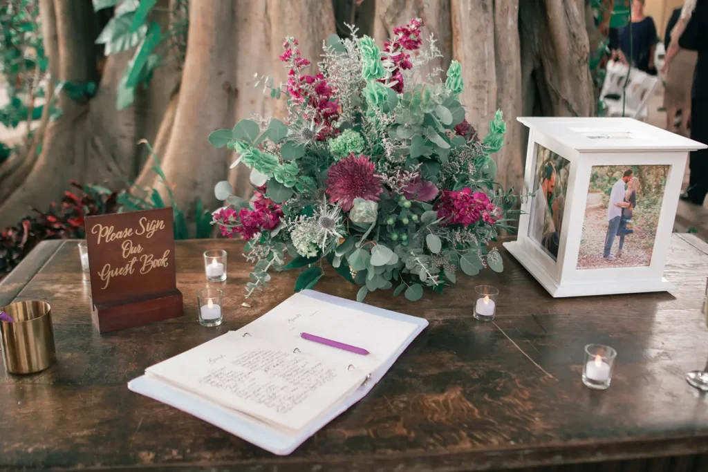 guest book by large tree at South Florida wedding