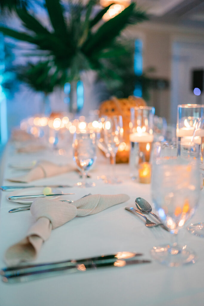 close up view of wedding reception table with candles