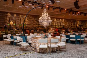 Large ballroom decorated with hanging chandelier