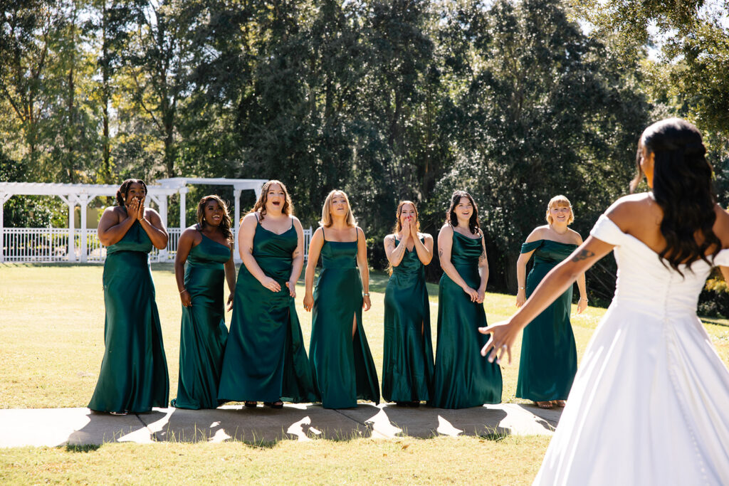 Bride doing a first look with her bridesmaids