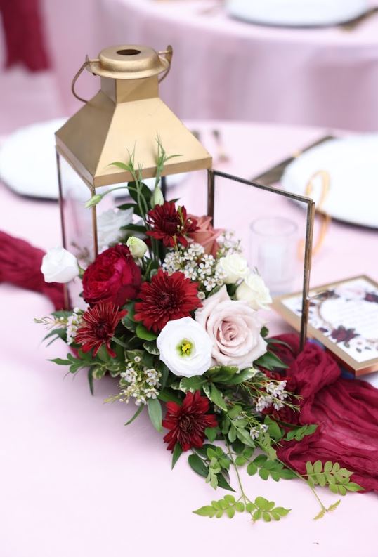lanterns and red and white florals as a 2026 wedding trend