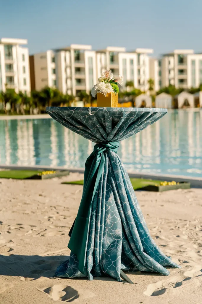 Tropical linen on cocktail table on beach at Conrad Orlando
