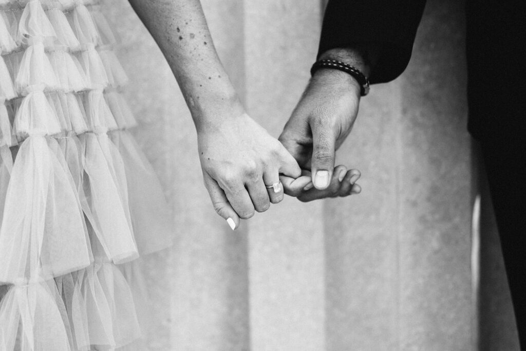 black and white photo of hands
