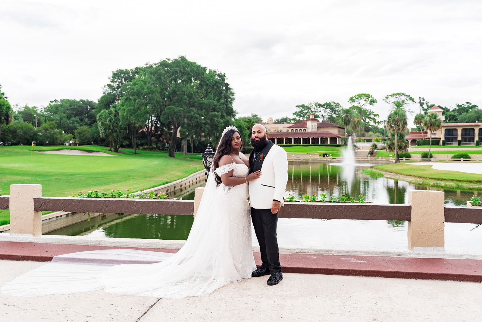 Bride and groom at Mission Resort by the water feature