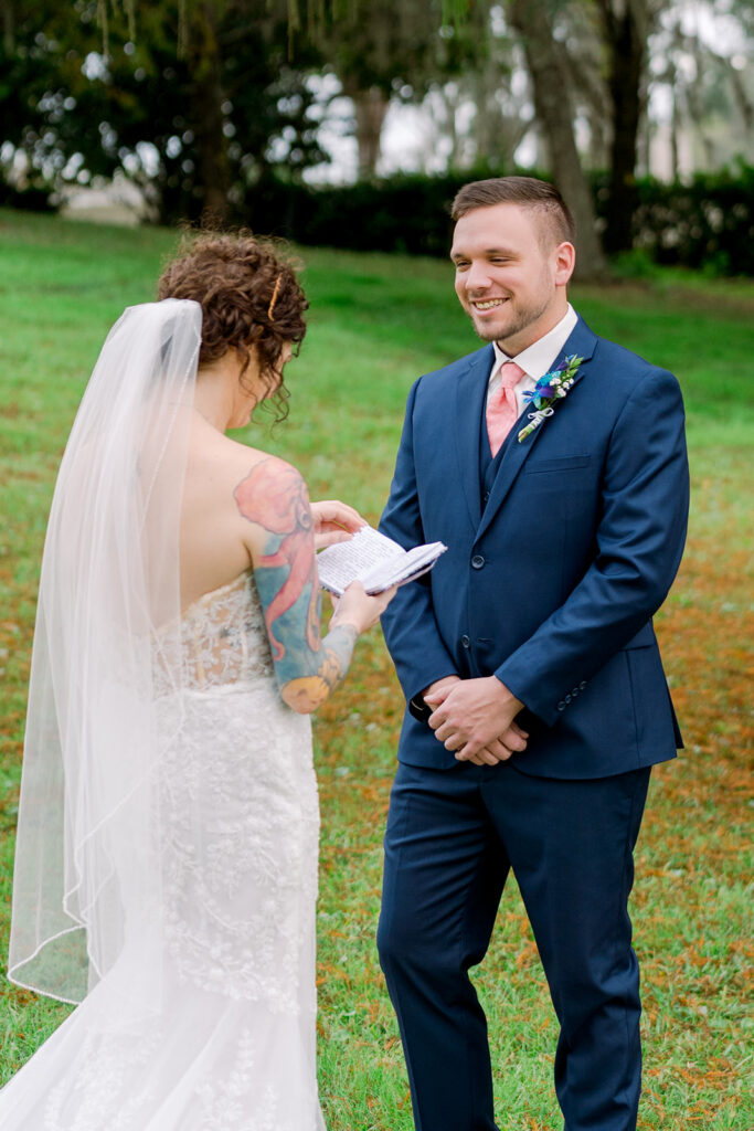 bride groom reading vows privately