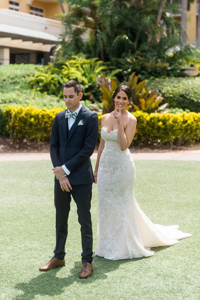 Bride shh first look with groom