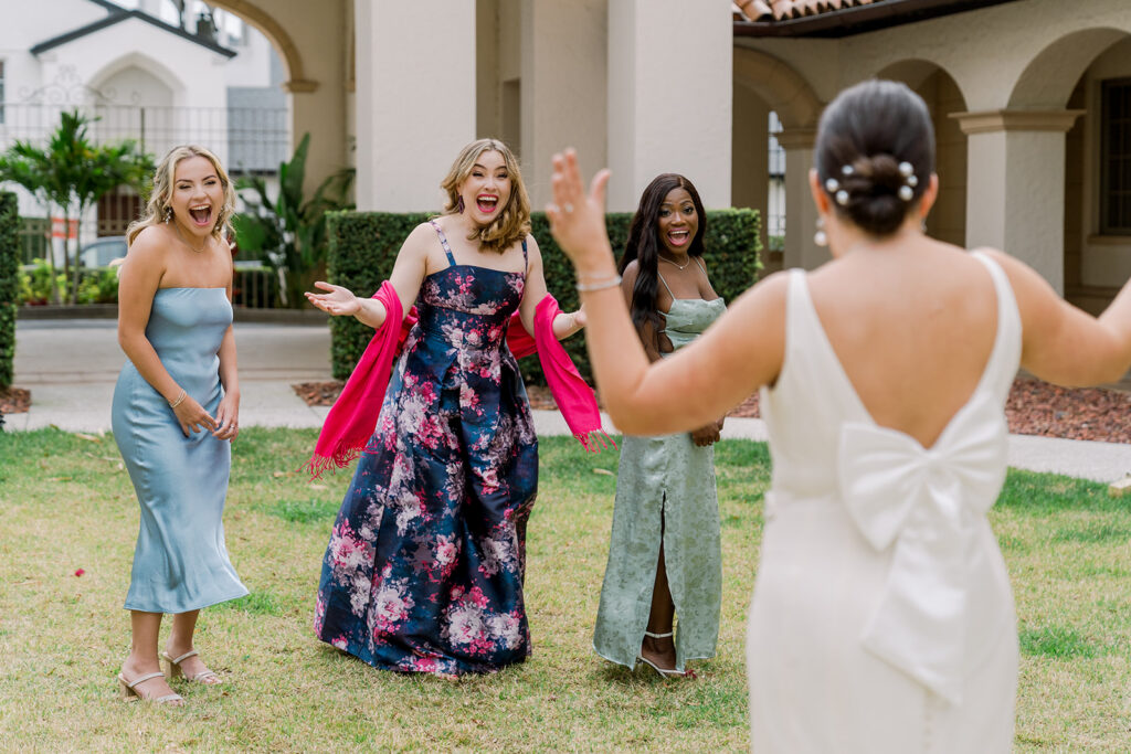 bridesmaids excited to see bride first look