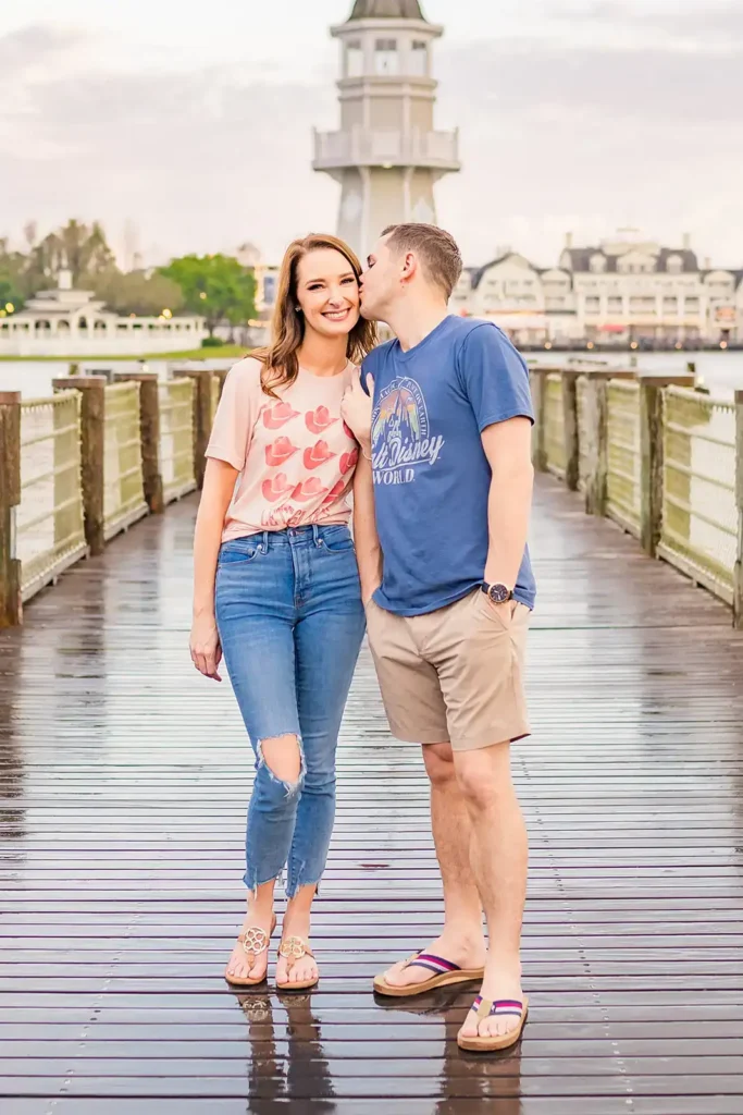 Couple on boardwalk at Disney's Boardwalk for engagement photo
