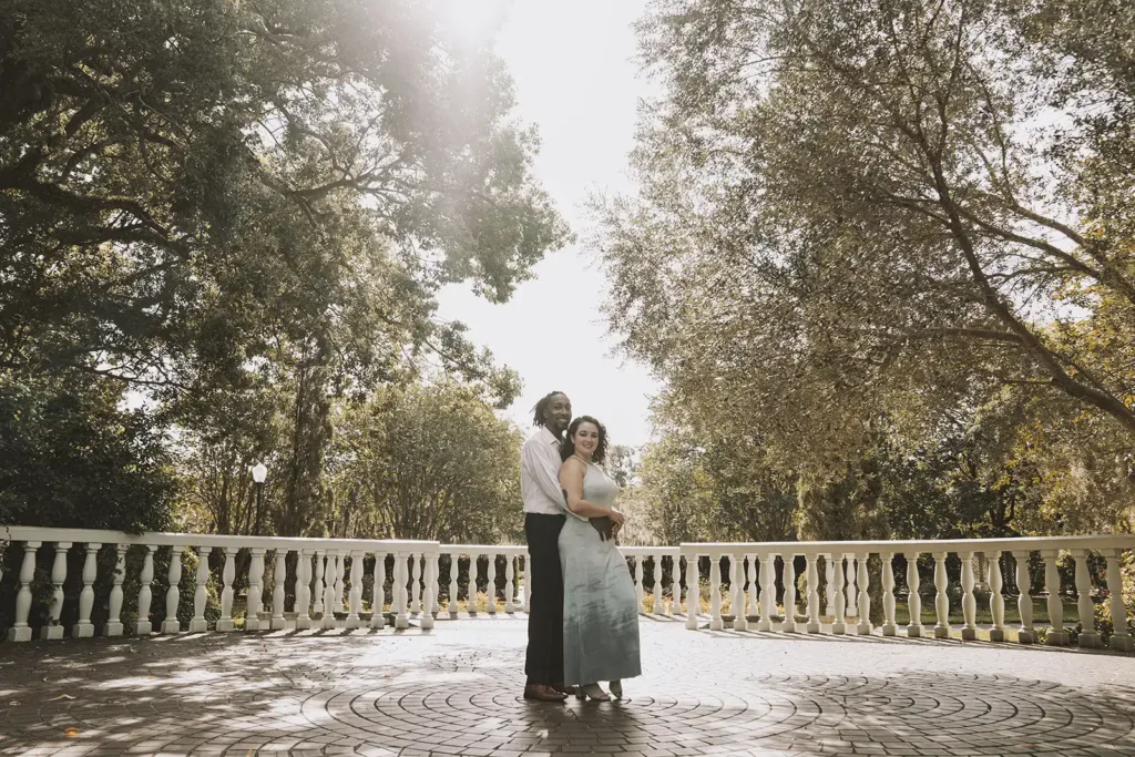 Engagement photo outside in a large courtyard