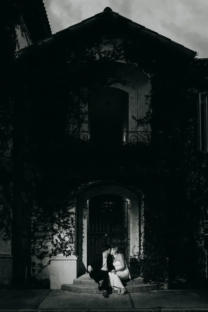 Black and white engagement photo at night