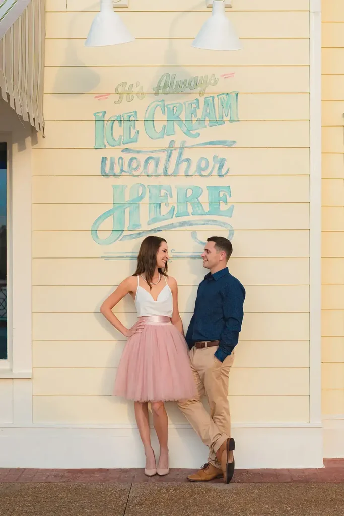 Disney's Boardwalk engagement photo shoot by ice cream sign