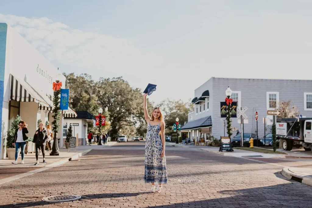 Female graduation shoot in street downtown Winter Garden