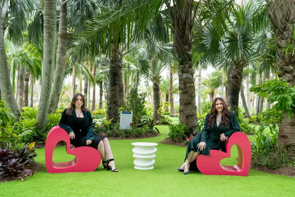 Women in love chairs Lake Nona sculpture garden