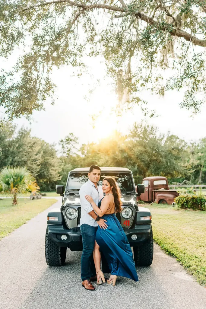 Couple in front of jeep for engagement photo shoot