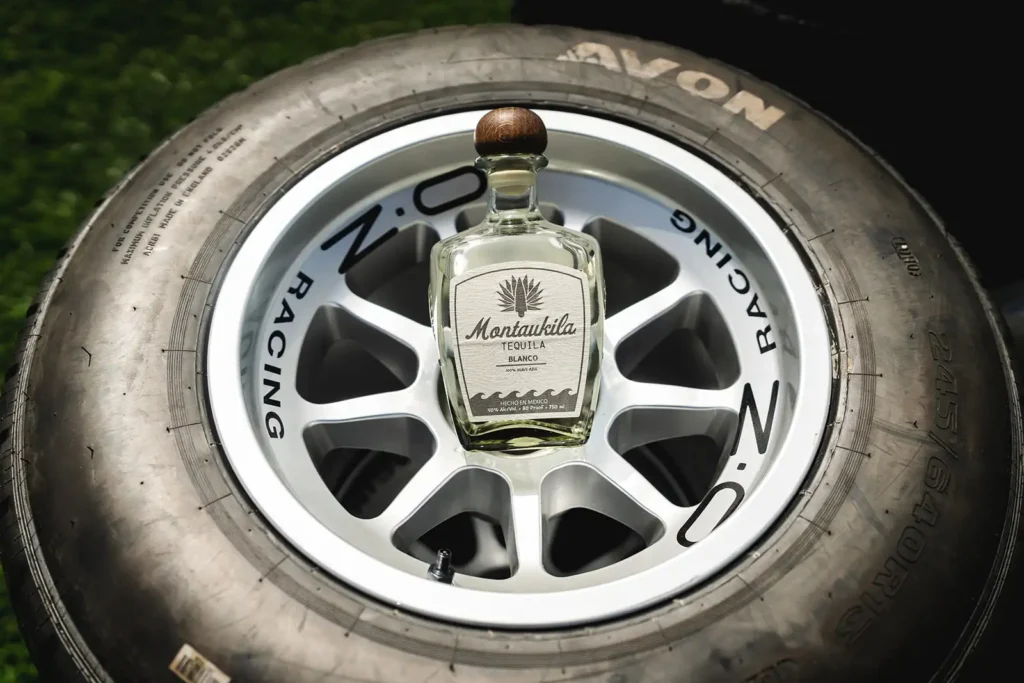 Montaukila Tequila bottle inside a tire