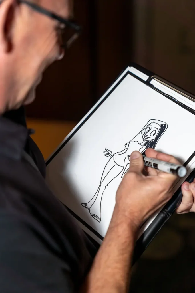 Live artists drawing caricatures at corporate event
