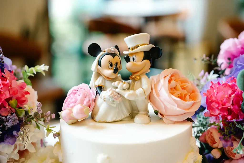 Bride and groom MIckey and Minnie wedding cake topper
