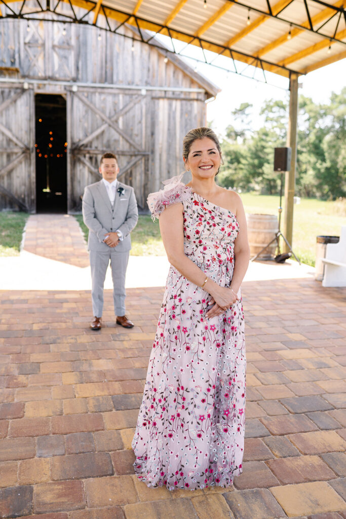 son approaches mother during first look at wedding