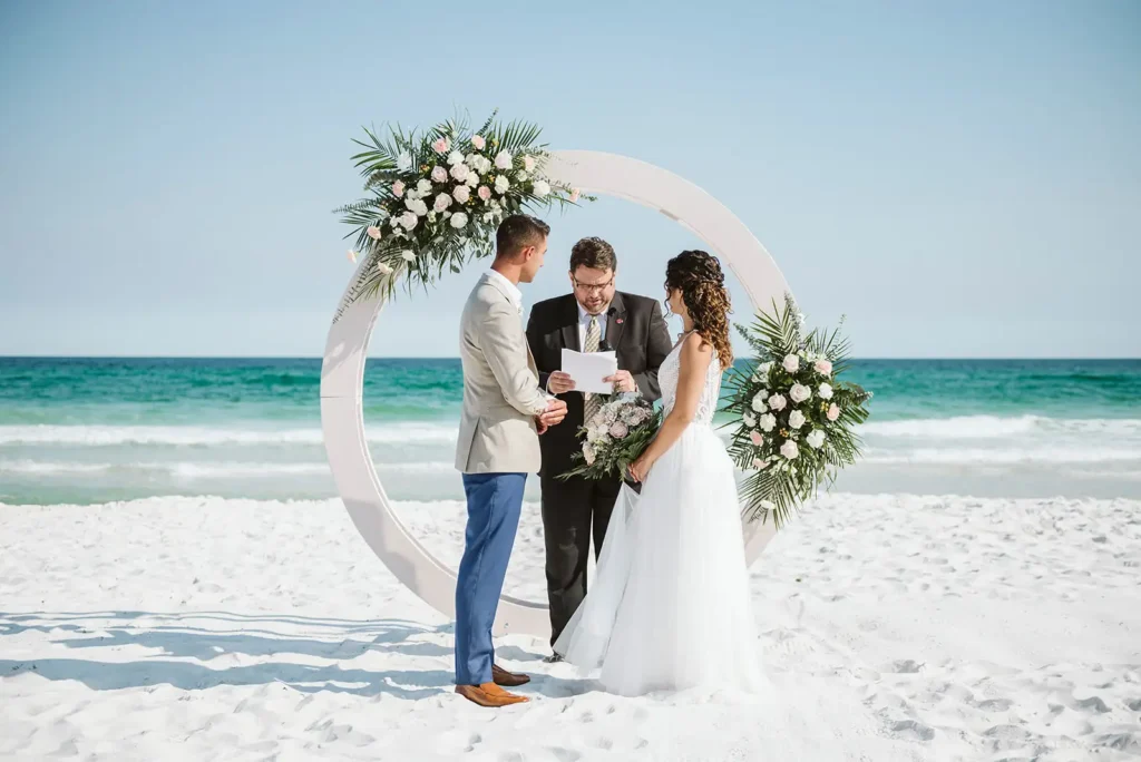 Bride and groom at small beach wedding ceremony in South Florida