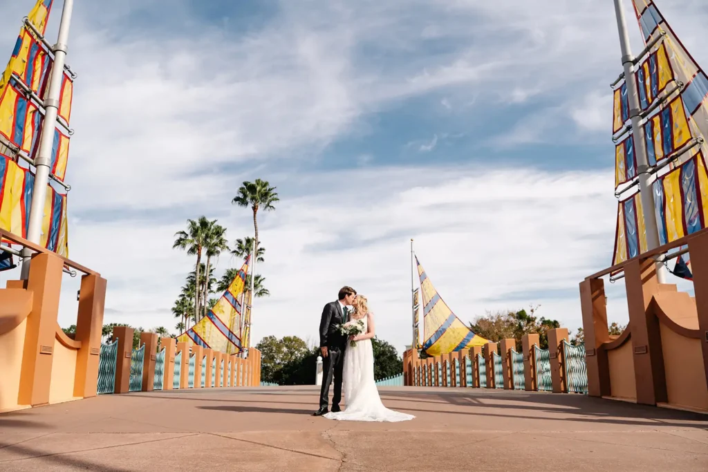 Bride and Groom on bridge at Swan and Dolphin Resort Disney World