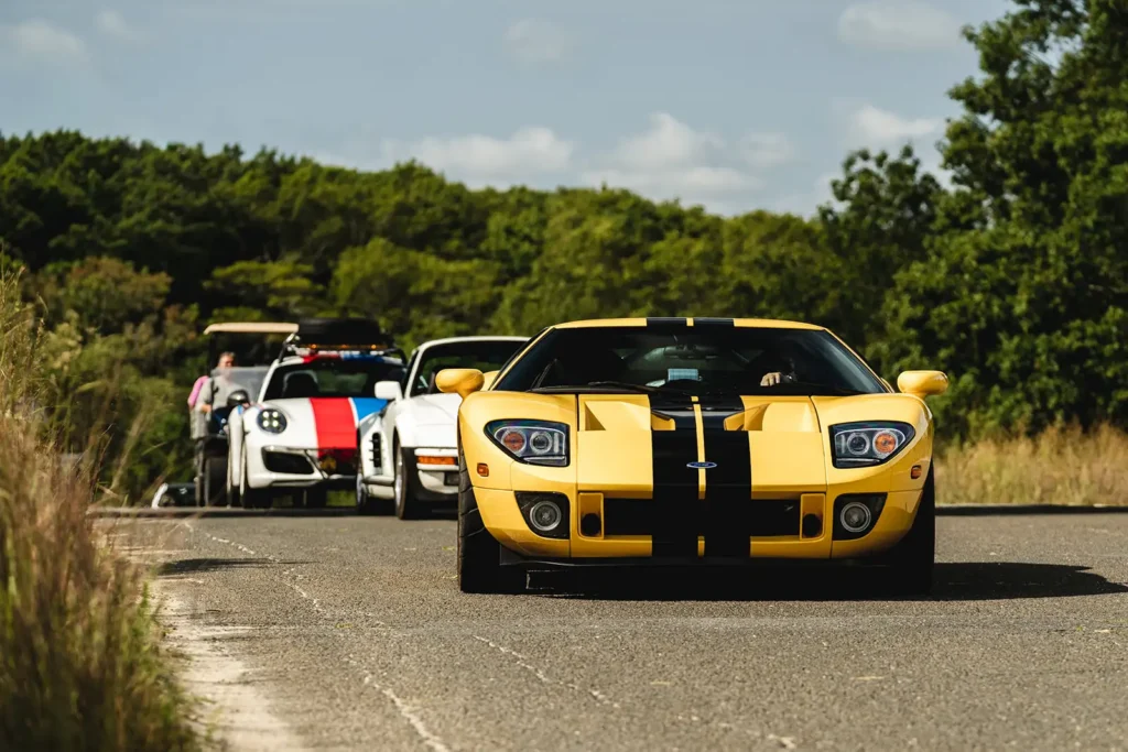 Line of vintage sports cars at The Bridge IX event