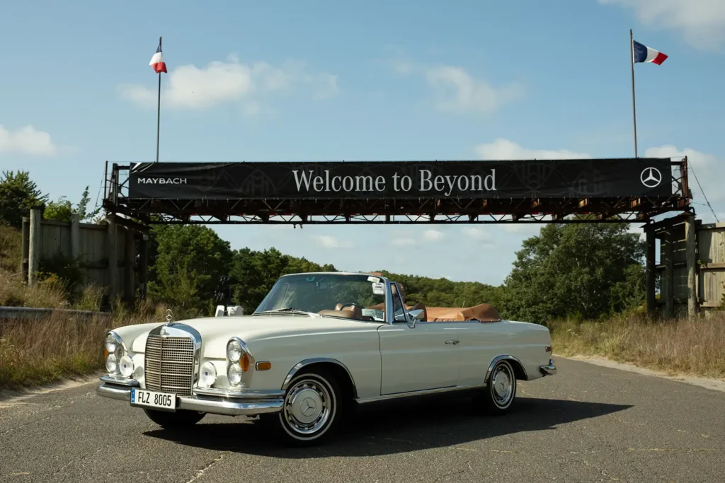 Vintage convertible Mercedes on race track at The Bridge event