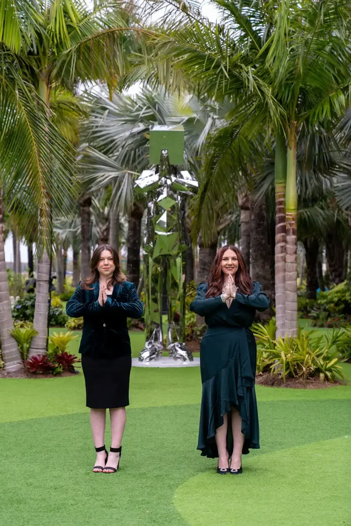 Woman posing in sculpture garden in Lake Nona, FL