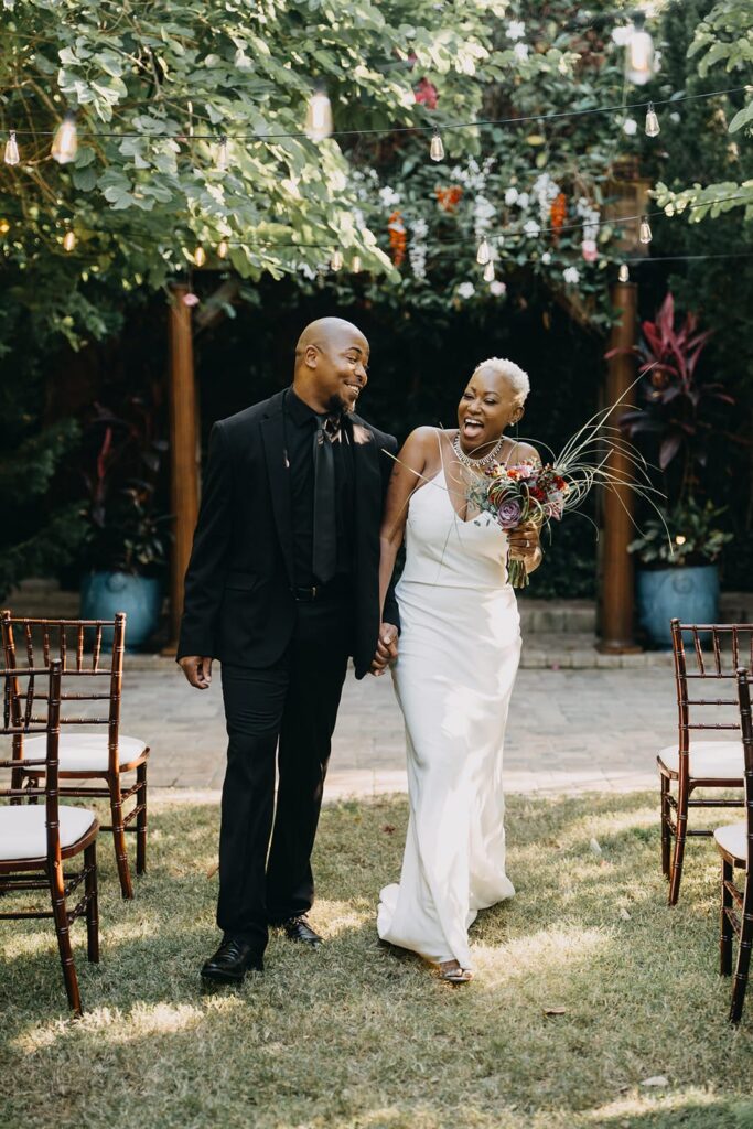 Bride and groom private photo at outdoor ceremony