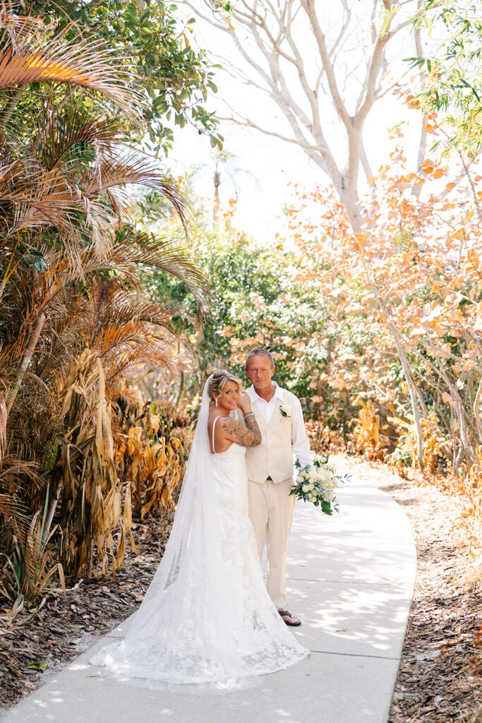 Wedding day portrait on pathway at Rosen Shingle Creek
